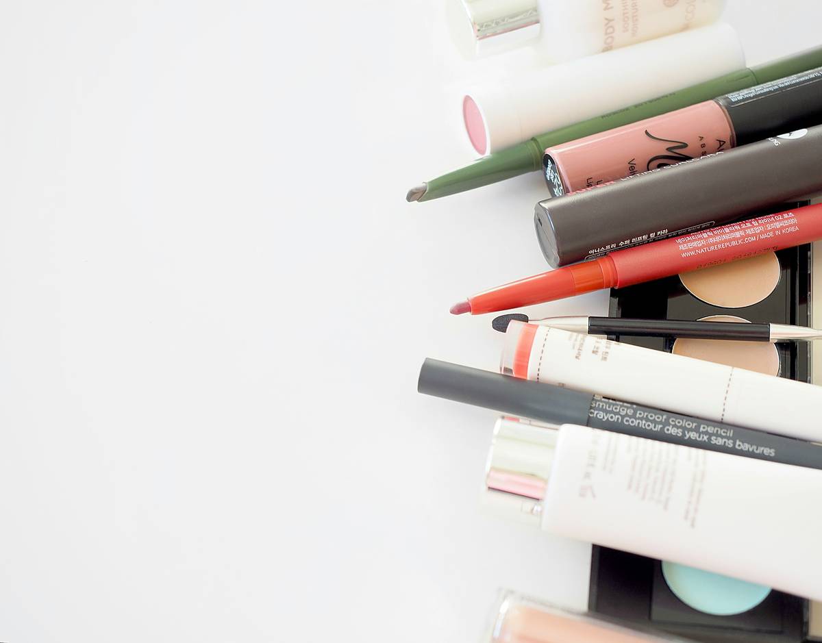 affordable makeup idea with complete drugstore routine laid out on vanity